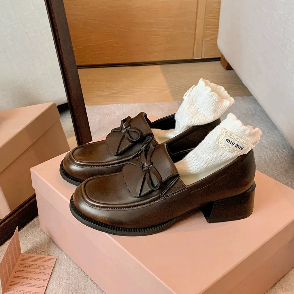 新款秋季新款miu系增高5cm翻盖蝴蝶结懒人粗跟厚底乐福鞋女小皮鞋
20+人
